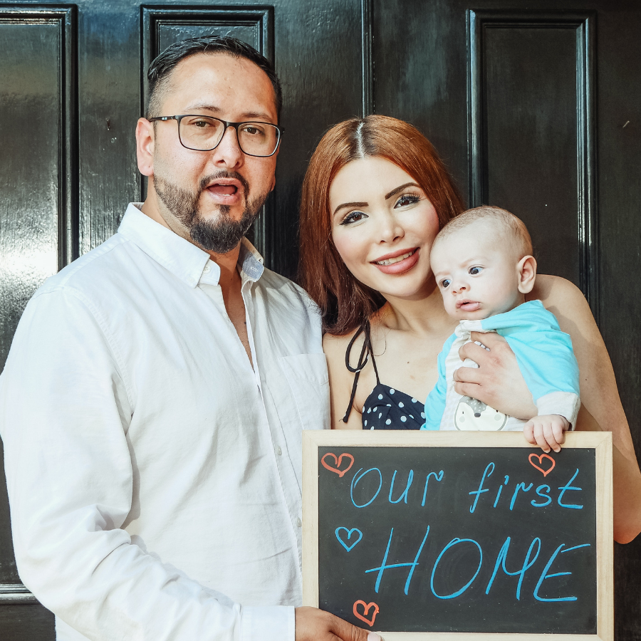 couple and baby moving into their first home